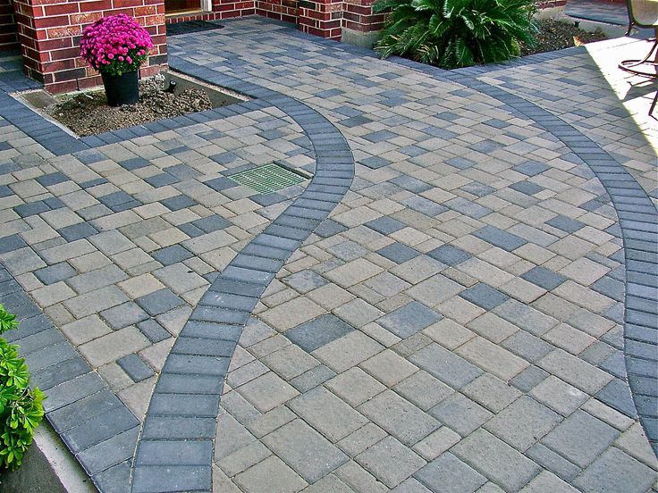 Concrete Paving - Concrete pavers for driveway, patio or pool deck. Pavers are multi-colored pieces of concrete, which are interlocked to form a durable surface for walkways, driveways and patios